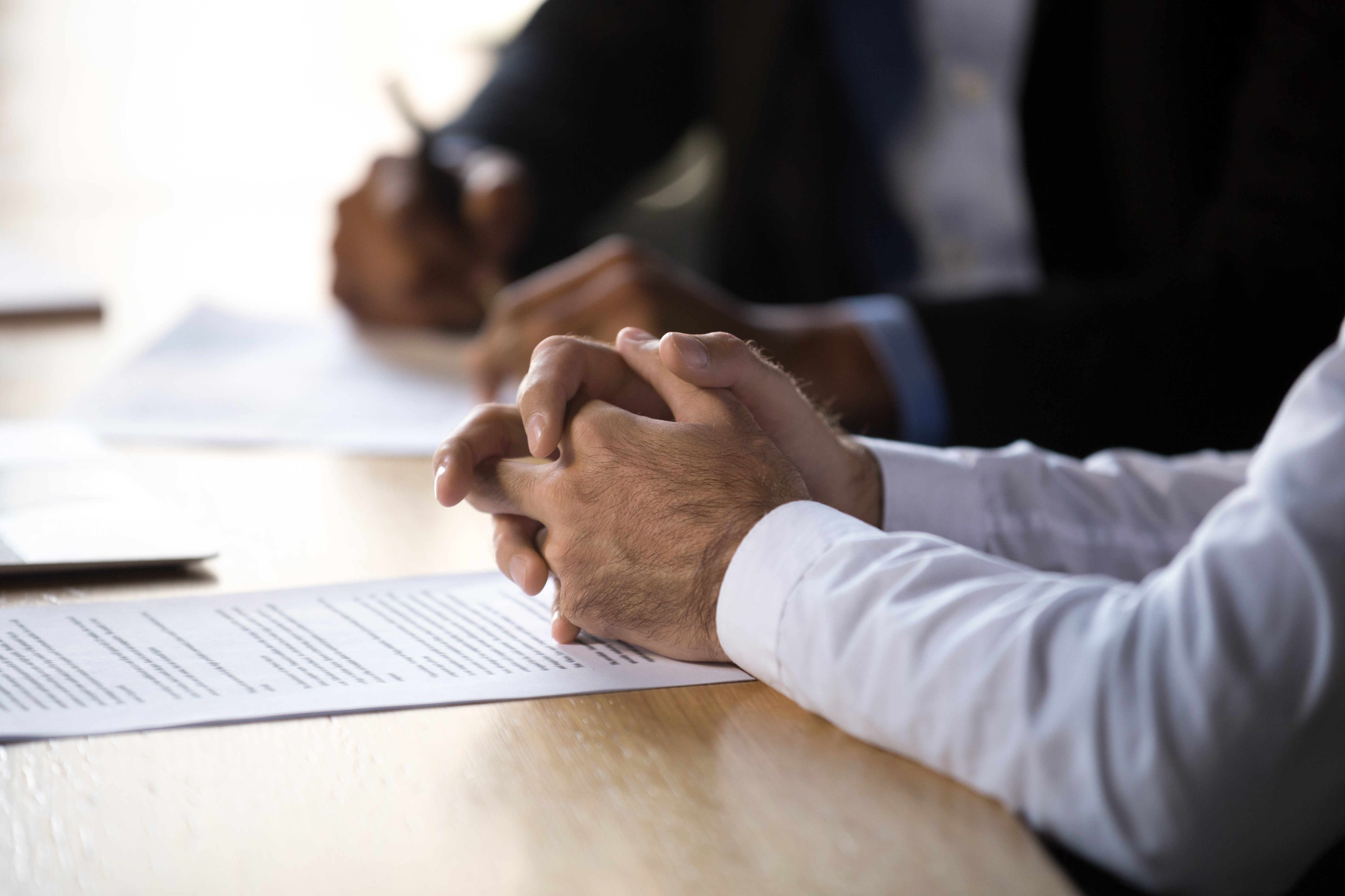 Business meeting discussing financial documents and accounting advice